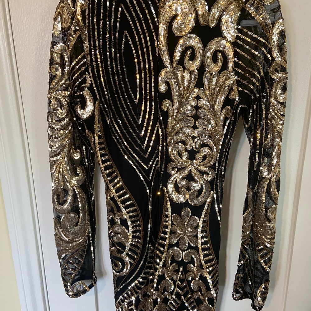 Beautiful black and gold sequin mini dress
